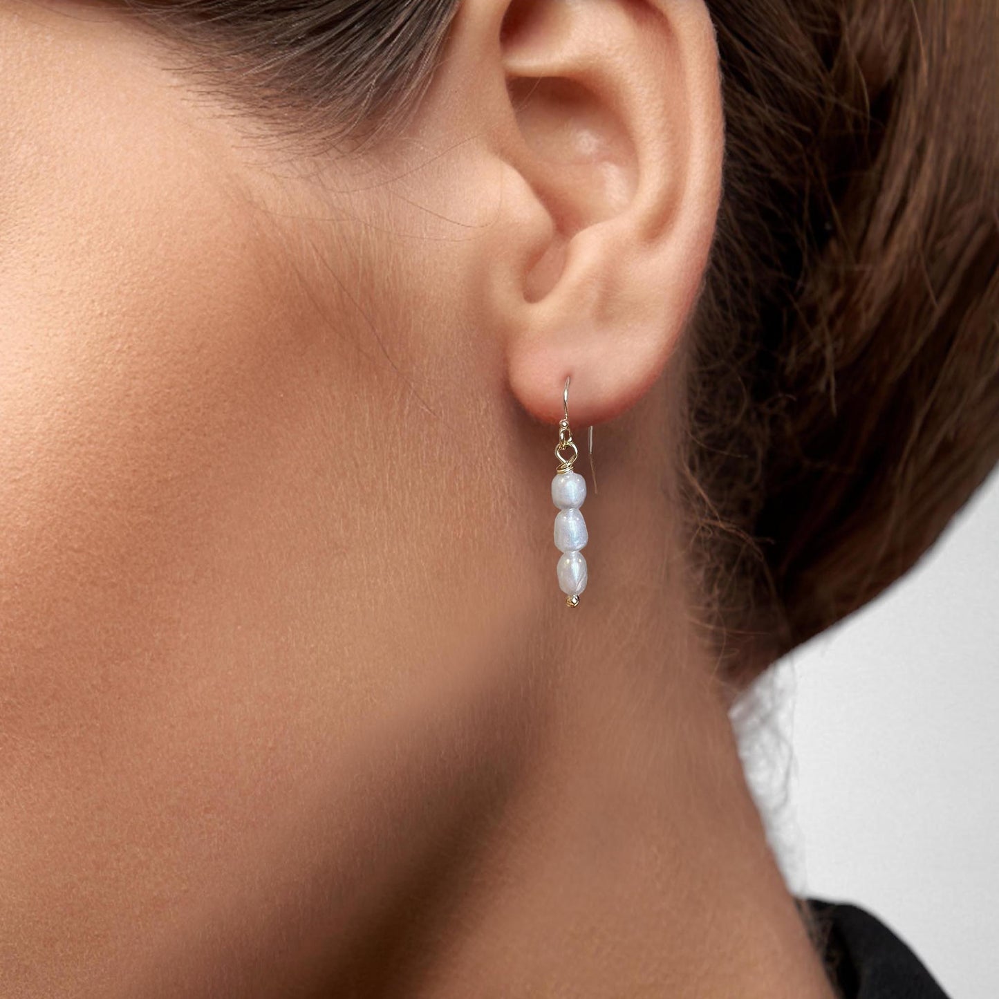 Gull og þrjár perlur