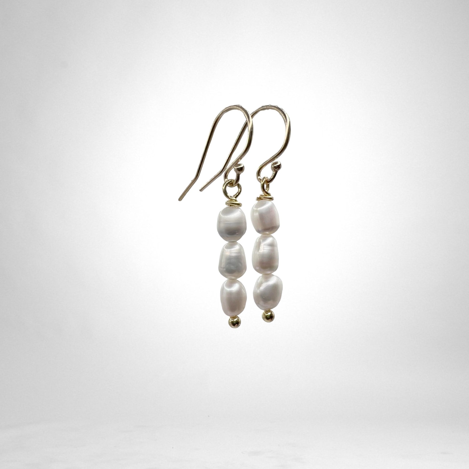 Three Pearl gold earrings