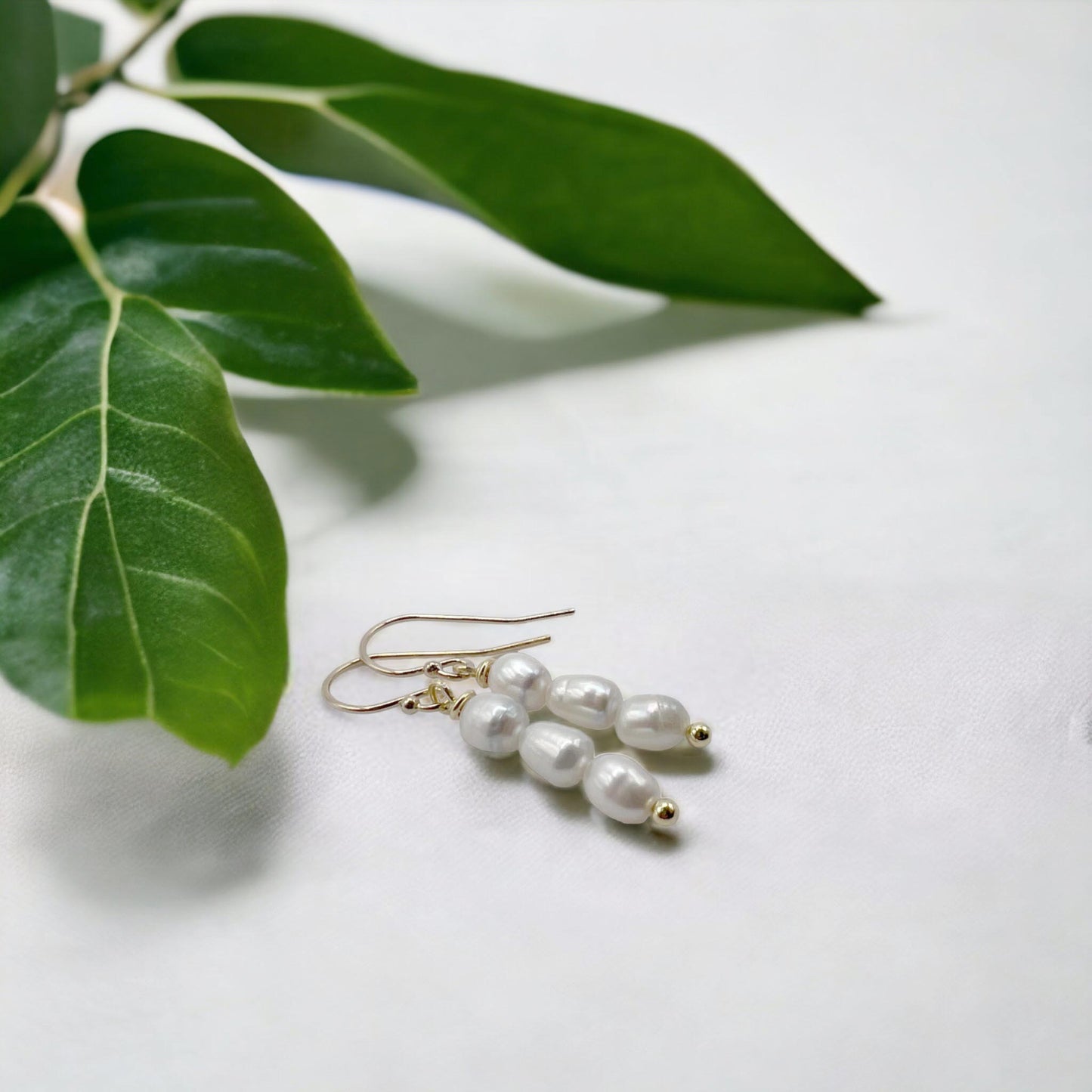 Gull og þrjár perlur