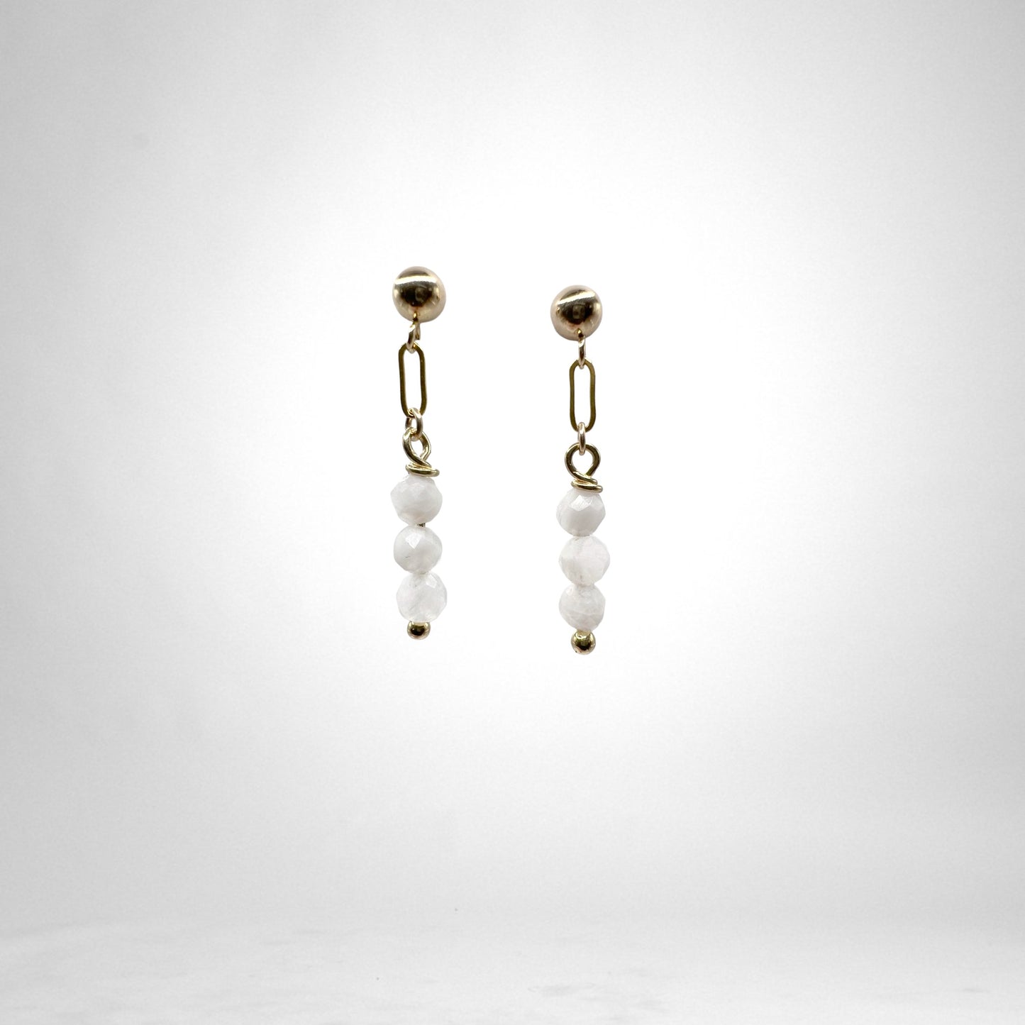Monstone gold earrings