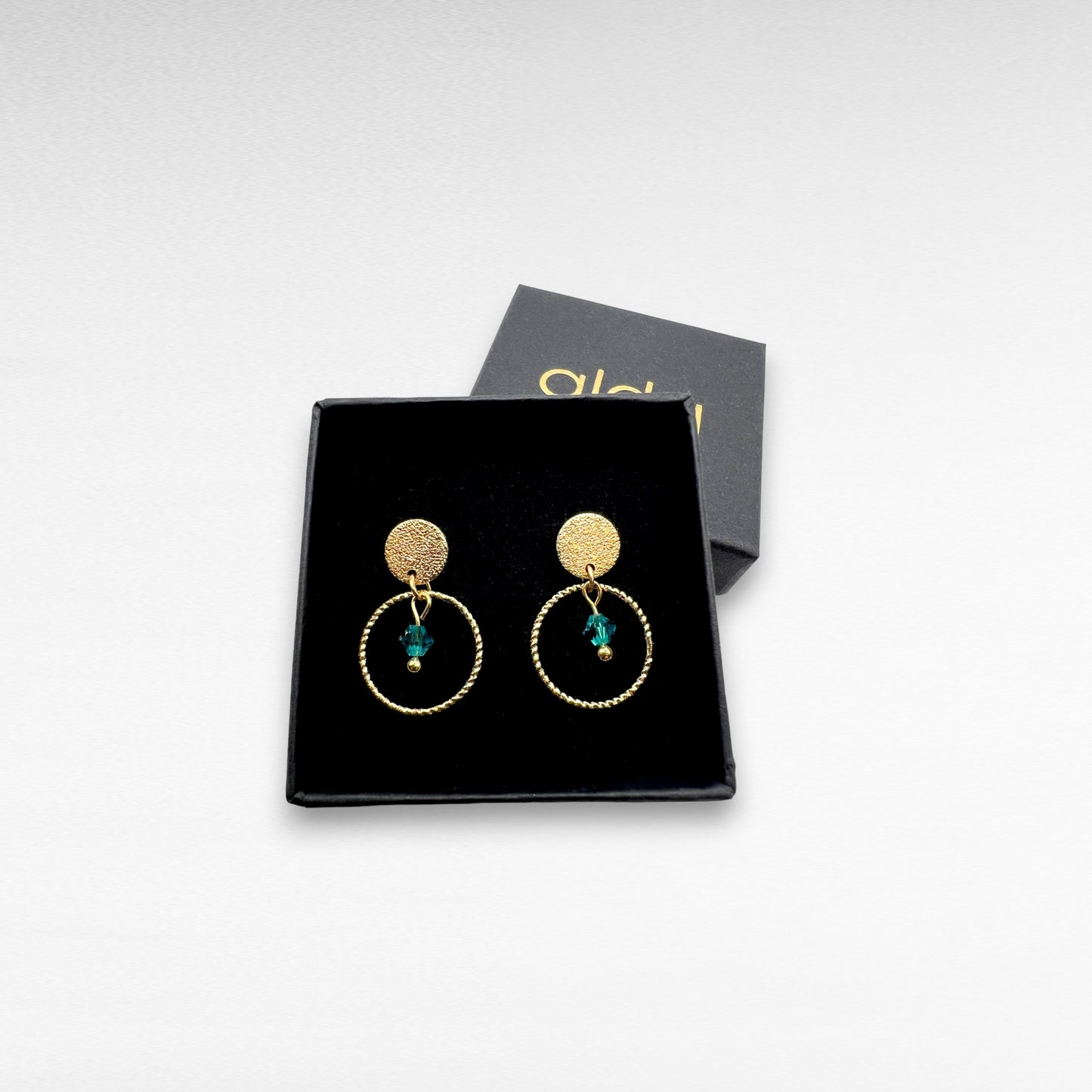 Glitrandi gull lokkar