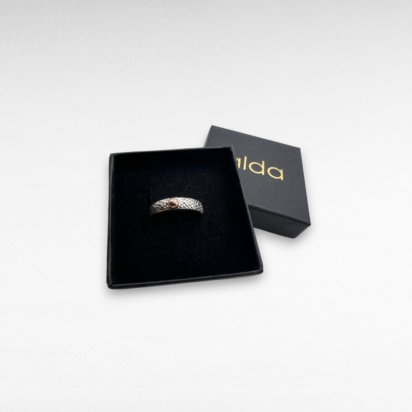 Silver ring with Copper ball