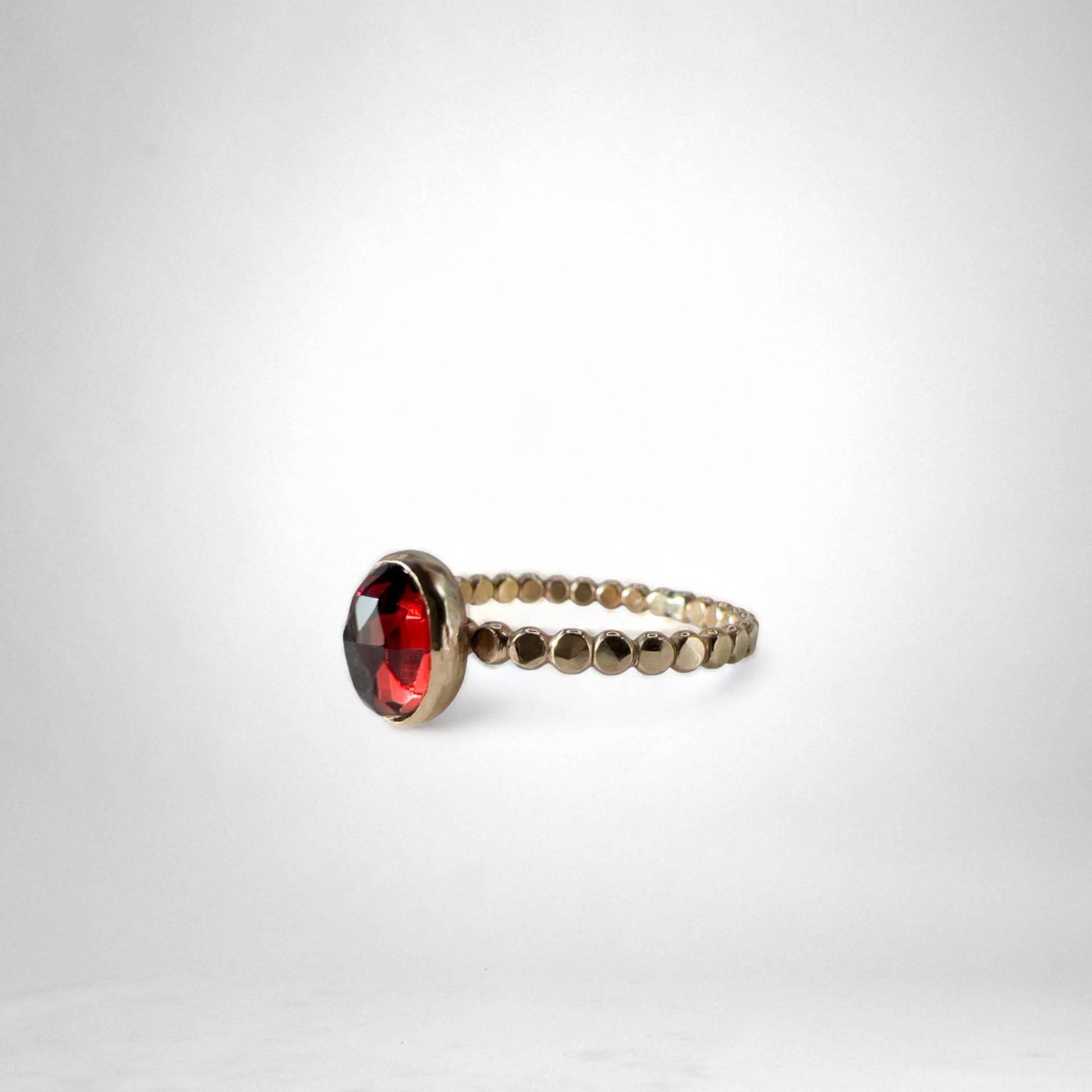 Red garnet gold ring