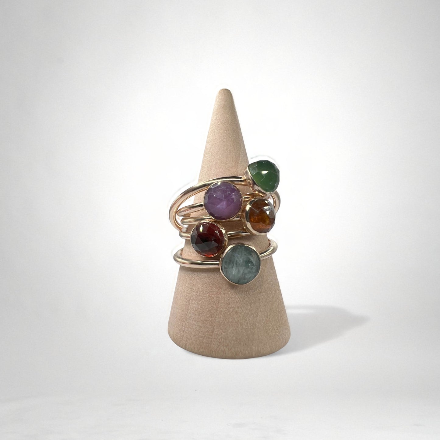 Gold rings with colorful gemstones