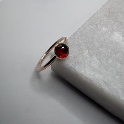 Red garnet gold ring